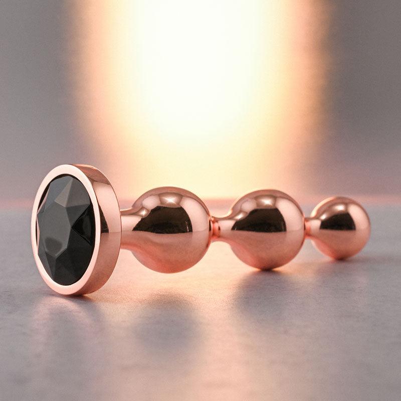 Gender X GOLD DIGGER SMALL - Rose Gold Small Butt Plug with Black Gem Base - GX-BP-9123-2